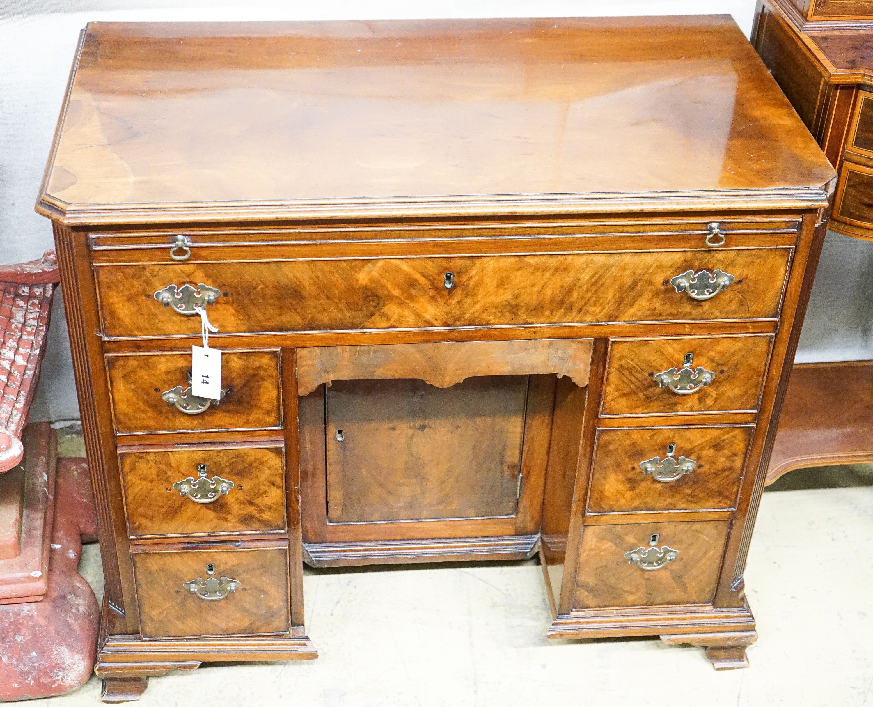 A George II style mahogany kneehole desk, length 92cm, depth 52cm, height 81cm